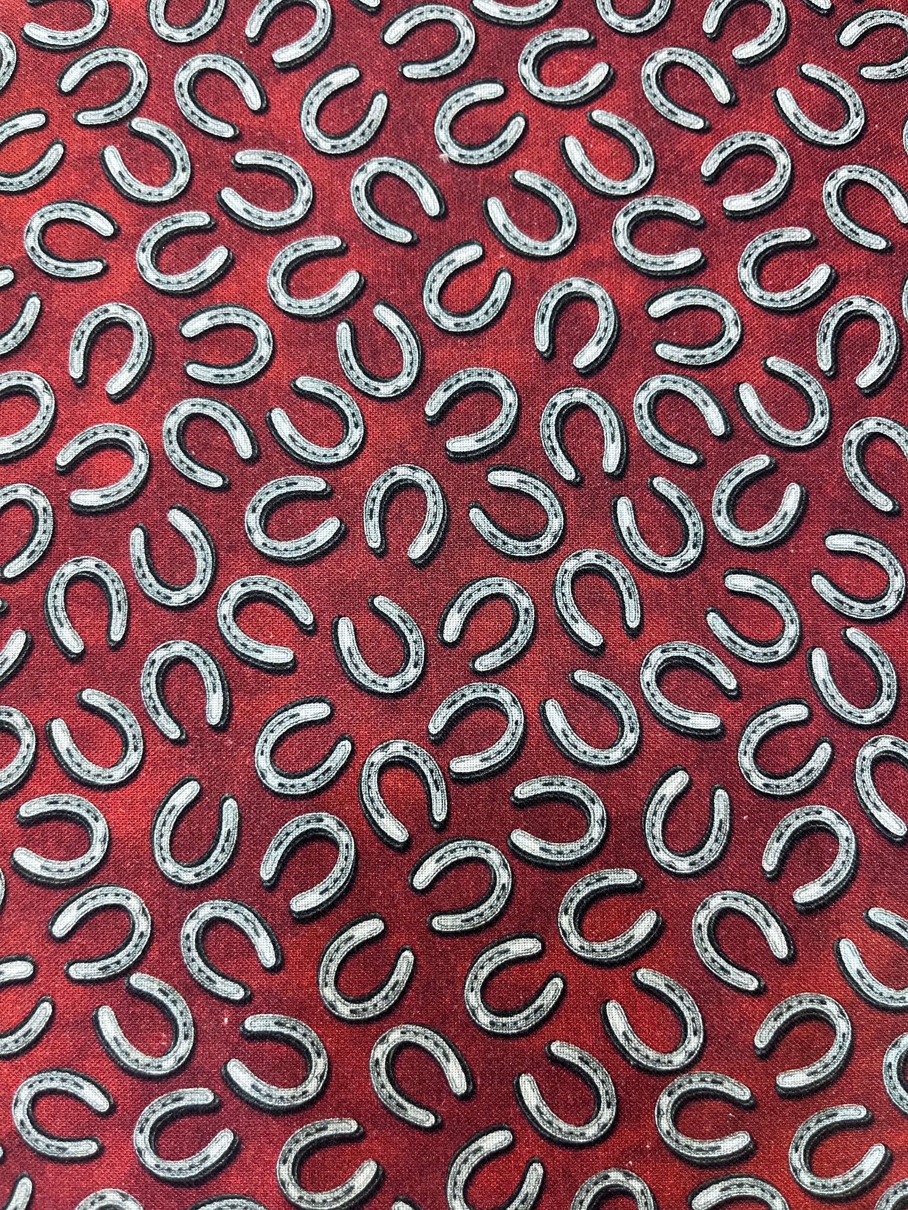 Benartex - Yellowstone - Tossed Horseshoes Brick Red Fabric