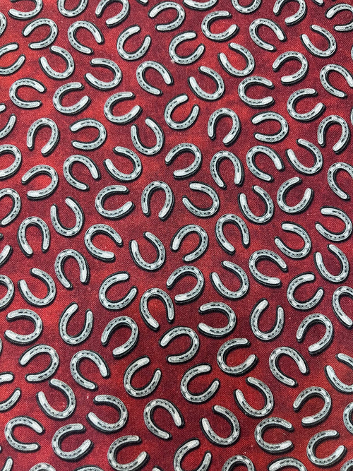 Benartex - Yellowstone - Tossed Horseshoes Brick Red Fabric